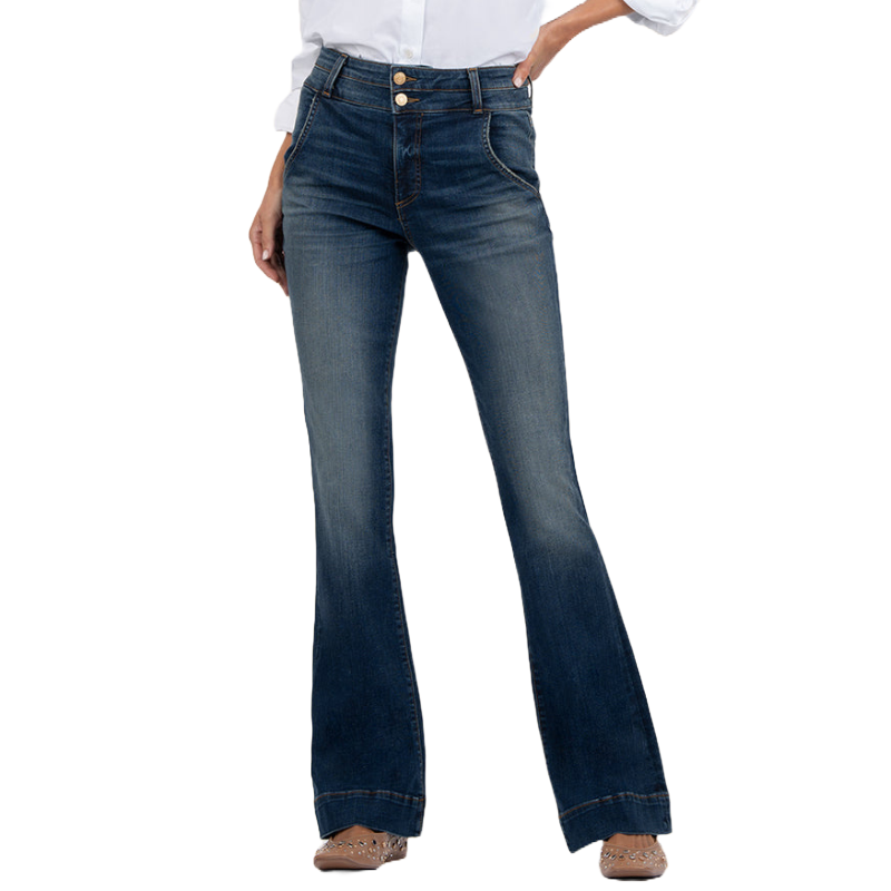 High-waisted flared jeans with a double-button closure, front pockets, and a faded denim wash. Paired with a white shirt and brown studded shoes.