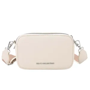 A small beige crossbody bag with silver hardware and a detachable strap, featuring the text \“MIA K COLLECTION\“ on the front.