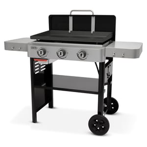 28\“ Weber Gas Griddle features a three-burner setup with a flat cooking surface, side shelves, and a black metal frame with wheels for mobility.
