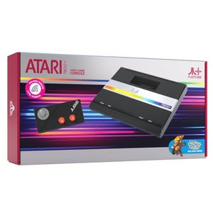 Atari 7800+ video game console with a wireless CX40+ gamepad, featuring the game \“Crystal Quest\“ included. The packaging showcases a sleek, modern design with rainbow accents.