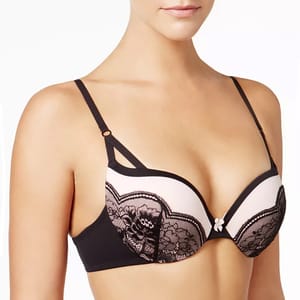 A lace-trimmed push-up bra with black detailing, featuring a small bow at the center and adjustable straps.