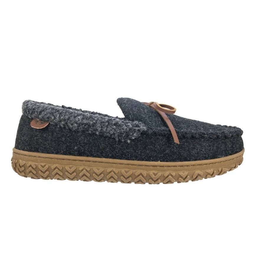 A dark gray moccasin slipper with a leather lace, featuring a textured gum sole and cozy knit lining.