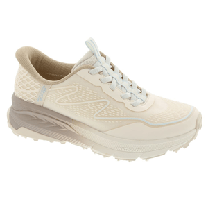 A beige and cream sneaker with light blue accents, featuring a wavy pattern on the sides, a textured heel, and a thick sole designed for comfort and support.