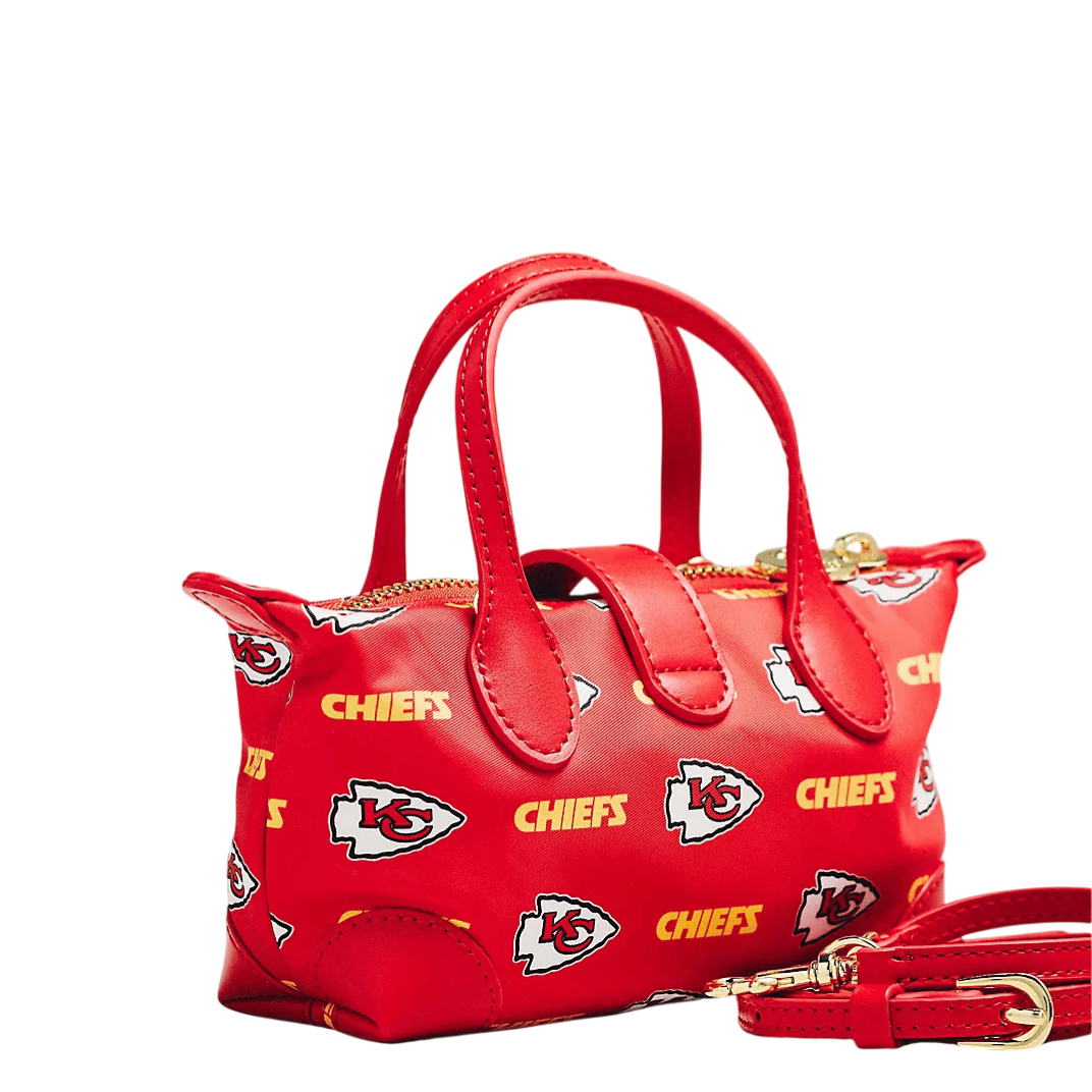 Red handbag with Kansas City Chiefs logos, featuring double handles and a detachable crossbody strap.