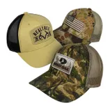 Three trucker caps with camo designs: one with a \“Realtree\“ patch, another with a U.S. flag patch, and a third with a \“Mossy Oak\“ patch.