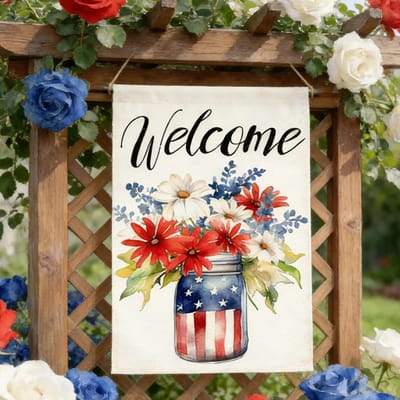 A welcome banner features floral artwork with red, white, and blue flowers in a star-spangled jar. It is displayed on a trellis adorned with decorative roses in matching colors.
