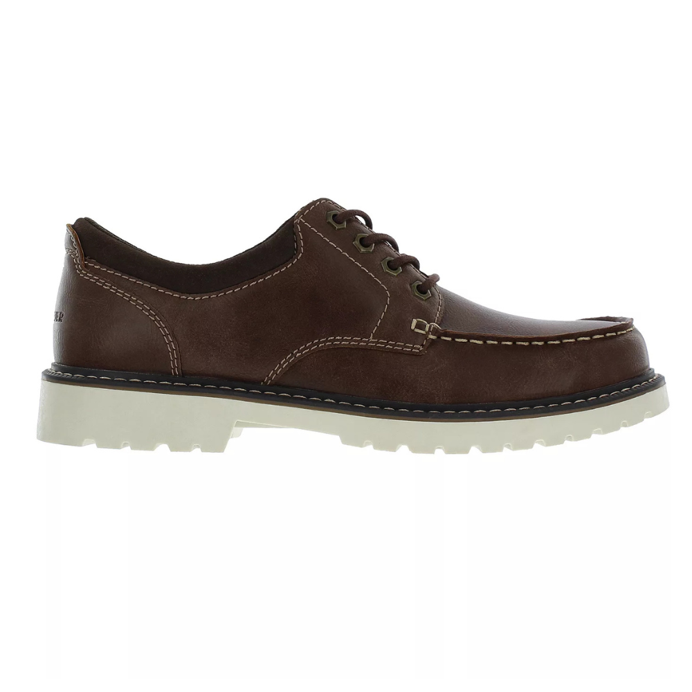 Brown leather lace-up shoe with white lugged sole, featuring moc toe stitching and metal eyelets.