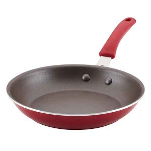 Rachael Ray 10\“ Frying Pan with a red exterior, nonstick gray interior, and a red handle.