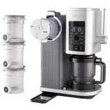 Ninja Thirsti Drink System with three specialty pods, featuring a sleek design and a user-friendly control panel, designed for customizable beverage creation.