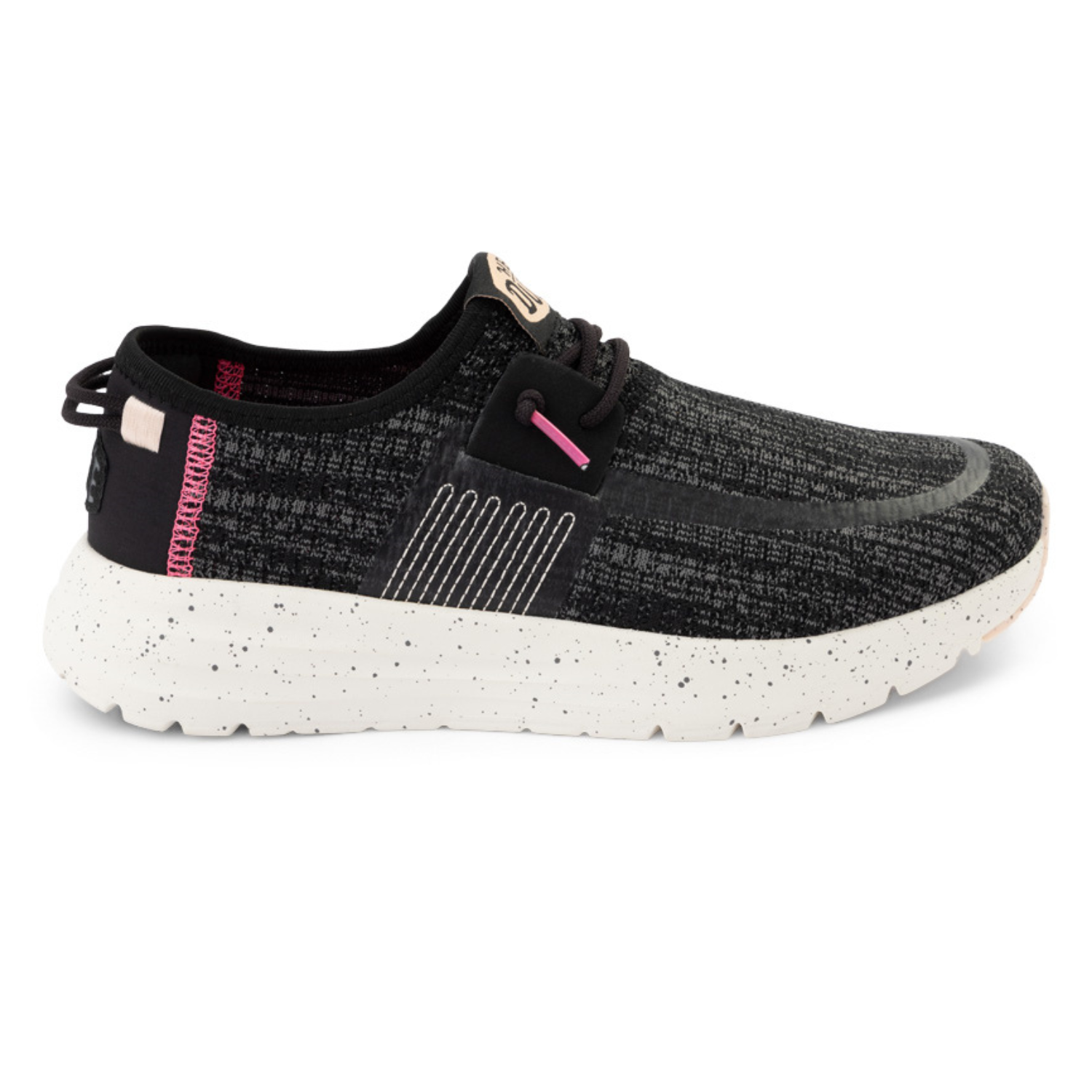 Hey Dude Sirocco Slip-On Shoes feature a black textured upper with pink accents, set on a white speckled sole. They have a casual, sporty design with lace-up details, providing a comfortable fit.