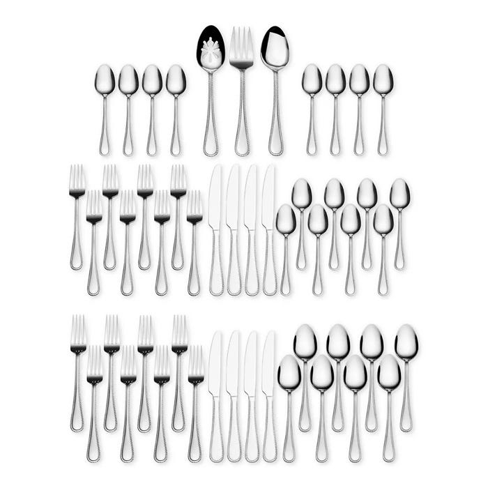 A set of stainless steel cutlery including spoons, forks, knives, and serving tools.