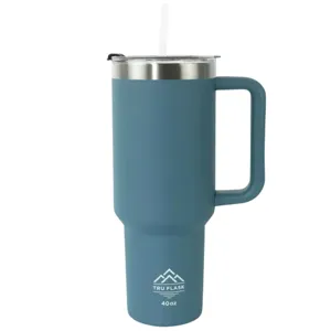 A blue Tru Flask 40oz tumbler with a handle and lid, featuring a straw for easy sipping.