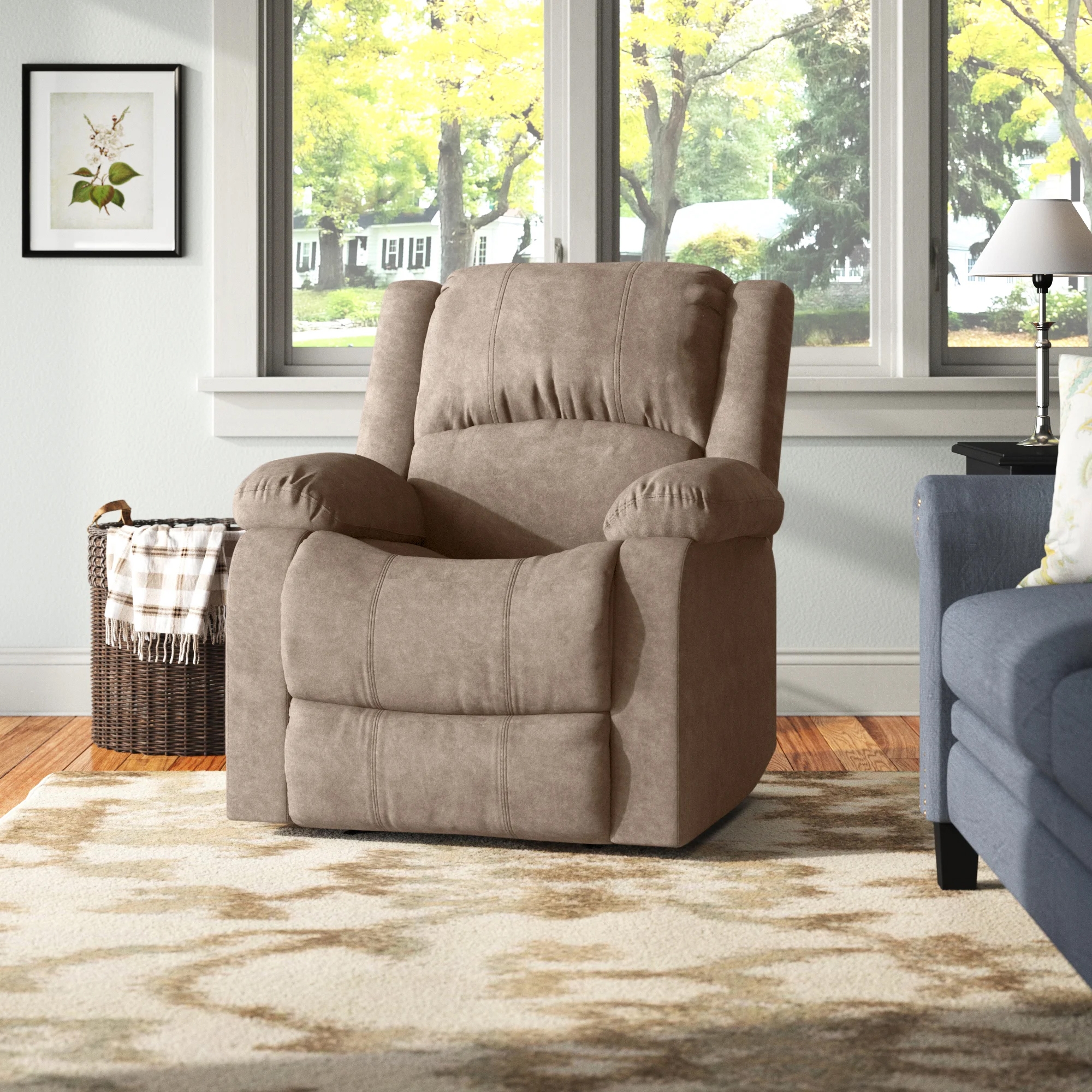 A brown recliner chair in a living room setting with a wicker basket and lamp on a side table nearby.