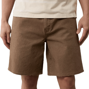 Brown knee-length shorts worn by a person, featuring a basic design with visible stitching and a straight hem.