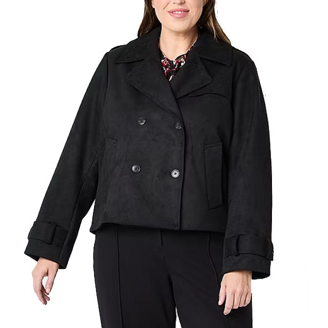 A black double-breasted peacoat with wide lapels and buttoned cuffs, featuring a short, boxy cut and a front pocket detail.