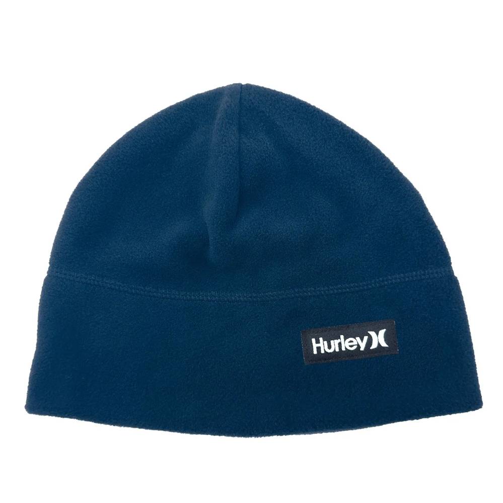A navy blue fleece beanie with a black and white Hurley logo patch on the front.