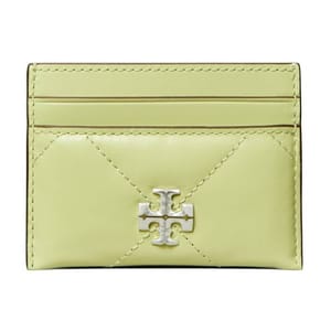 A light green leather card case featuring a quilted design with visible stitching and a metallic Tory Burch logo on the front. It includes card slots for organizing.