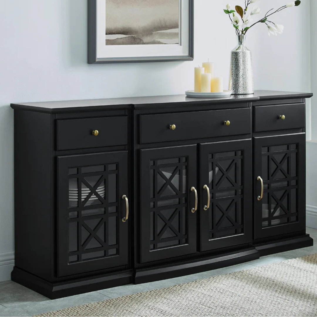 Black Walker Edison Sideboard & TV Stand with three drawers, four cabinets featuring glass pane doors with decorative cross patterns, and antique brass hardware. A simple and modern design suitable for storage and display.