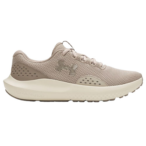 A beige athletic sneaker with breathable mesh upper, cushioned sole, and the Under Armour logo on the side.