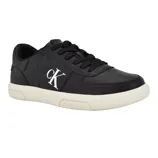 Black Calvin Klein sneaker with white sole and \“cK\“ logo on the side.