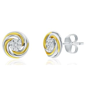 Silver Swirl Studs feature intertwined silver and gold swirls with a cluster of small diamonds at the center, creating a sophisticated and elegant design.