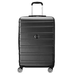 A black hard-shell suitcase with horizontal ridges, a retractable handle, four spinner wheels, and a circular logo in the center.