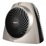 A Vornado space heater with a compact, sleek design featuring a front grill and control panel on top.