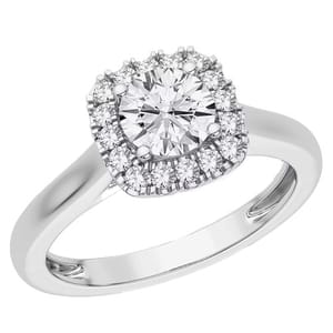 A white diamond engagement ring with a central round-cut diamond surrounded by smaller diamonds, set on a silver-colored band.