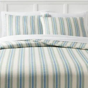 Striped bedding set featuring a pattern of blue and green vertical lines on a cream background, including a duvet and two pillowcases.