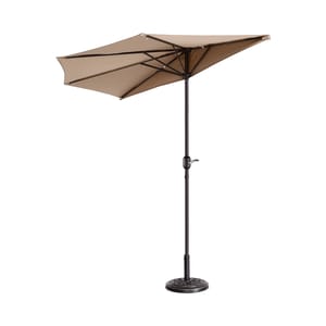A beige patio umbrella with a crank mechanism, supported by a metal pole and a decorative round base.