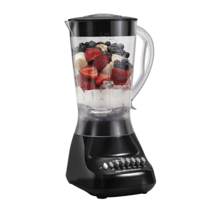 A black Hamilton Beach blender filled with fruit, including strawberries, bananas, blueberries, and ice, ready for blending.