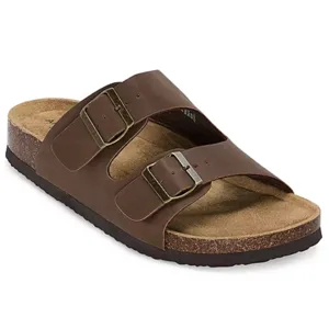A brown sandal with two adjustable straps and buckles, featuring a cork footbed and a dark rubber sole.