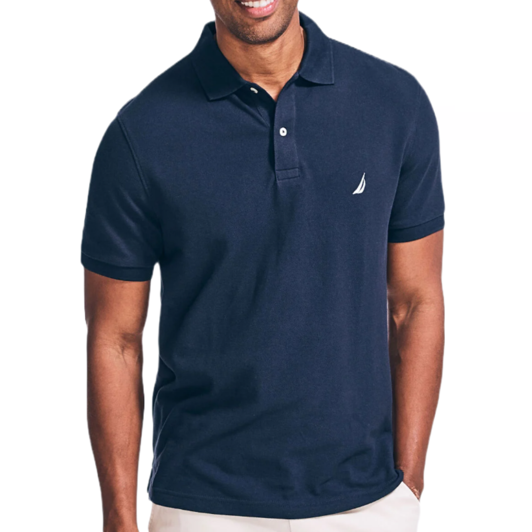 Nautica Classic Polo in navy blue features a short-sleeve design with a two-button collar and an embroidered Nautica logo on the chest. The shirt has a classic fit for casual style.