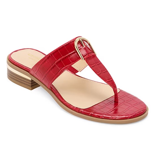 Red heeled sandals by Liz Claiborne feature a croc-embossed pattern, T-strap design, and gold-tone buckle detail. They have a low, stacked heel and an open-toe style for casual elegance.