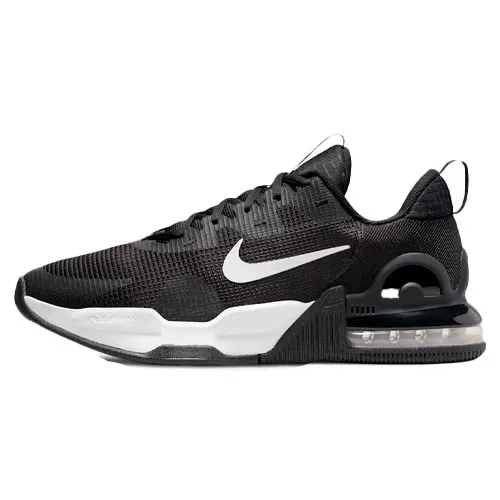 Black Nike athletic shoe with a white swoosh logo, featuring a visible Air unit in the heel for cushioning and a pull tab on the heel for easy slip-on.