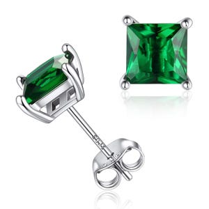 Sterling silver stud earrings with square-cut green gemstones secured by four prongs.