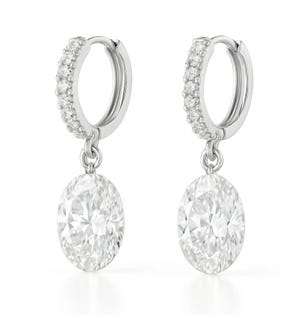 Elegant silver hoop earrings adorned with small diamonds, featuring large oval-cut diamond pendants.