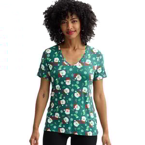 A green V-neck T-shirt with a festive Christmas pattern featuring Santa Claus faces, candy canes, snowflakes, and holly.