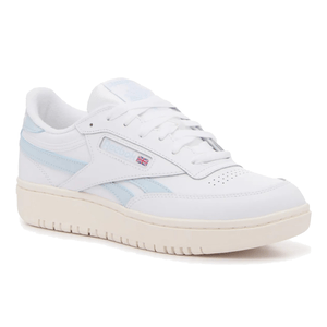 White Reebok Leather Double Revenge Shoes featuring light blue accents, a thick cream sole, and a low-cut design. Includes the Reebok logo with a Union Jack emblem on the side.