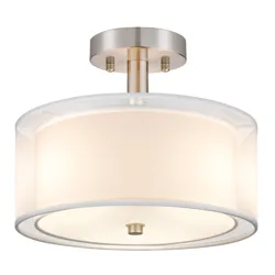 Semi-flush mount ceiling light with a beige drum shade and metallic fixture.