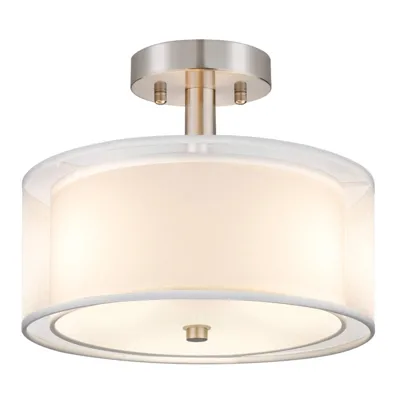 Semi-flush mount ceiling light with a beige drum shade and metallic fixture.