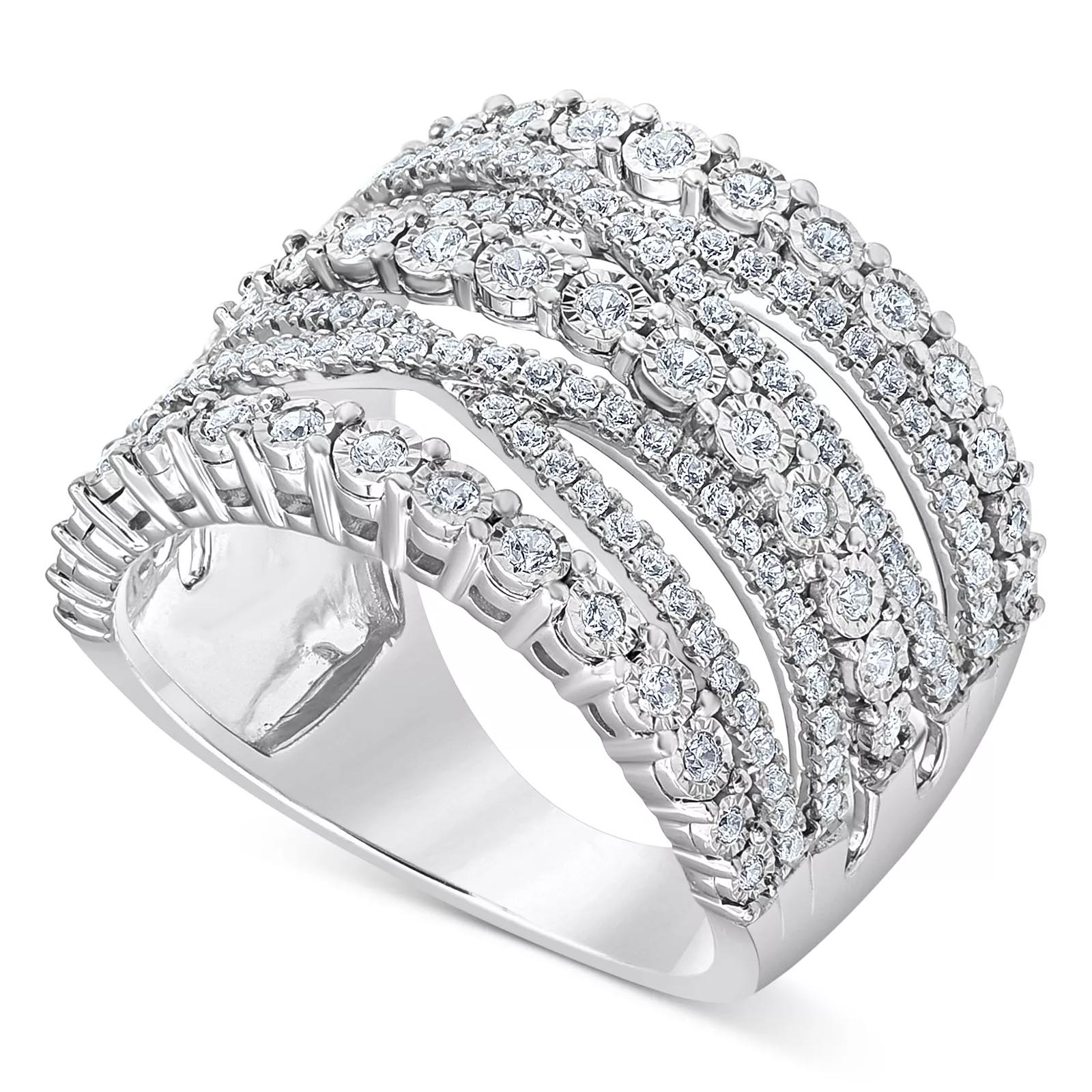 A silver ring with multiple rows of round-cut diamonds in an overlapping pattern, creating a wide, sparkling band design.