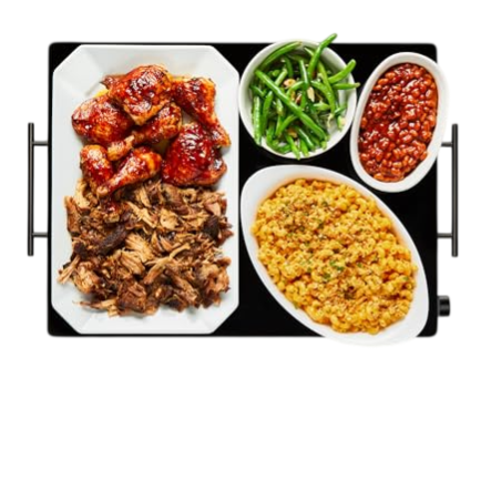 A black griddle with a 21\“x16\“ surface holds four dishes: saucy chicken wings, pulled pork, green beans, baked beans, and seasoned rice. The griddle features cool-touch handles for easy transport.