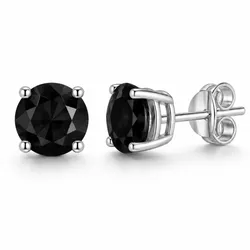 Pair of stud earrings featuring round black gemstones set in a four-prong silver setting with butterfly backings.