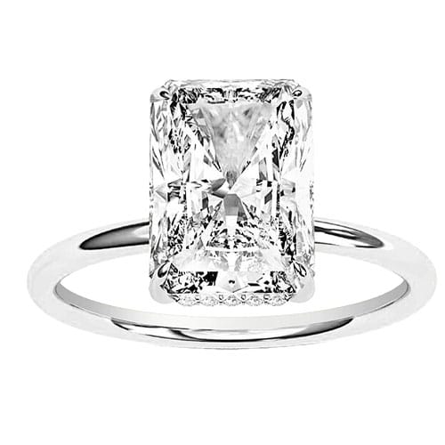 A solitaire ring with a radiant-cut diamond, featuring a sleek and simple band.