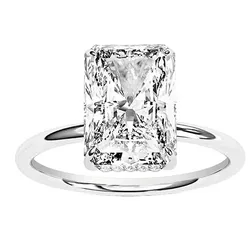 A solitaire ring with a radiant-cut diamond, featuring a sleek and simple band.