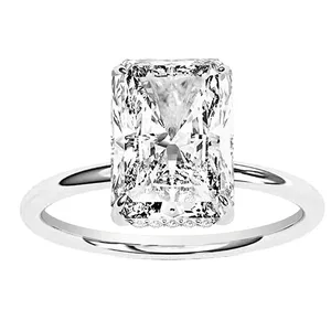 A solitaire ring with a radiant-cut diamond, featuring a sleek and simple band.