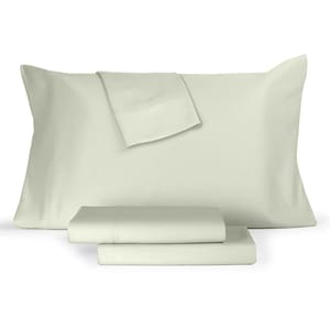 A light green sheet set including a pillowcase, a fitted sheet, and a flat sheet.