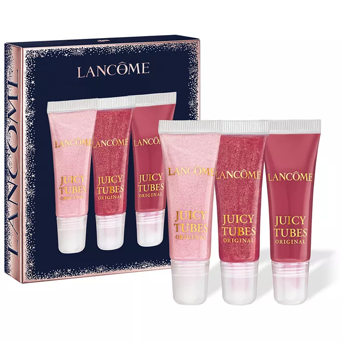 Lancôme Juicy Tubes Original lip gloss set contains three shades in sparkly and natural tones. The packaging displays the brand name and showcases the gloss tubes.