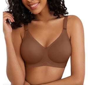 A brown, seamless wireless bra with adjustable straps, smooth cups, and a supportive design.